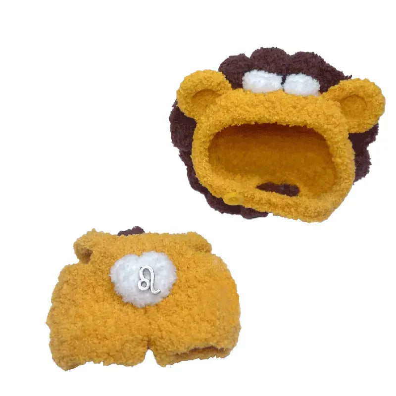 Pair of yellow and brown animal-themed slippers on a white background