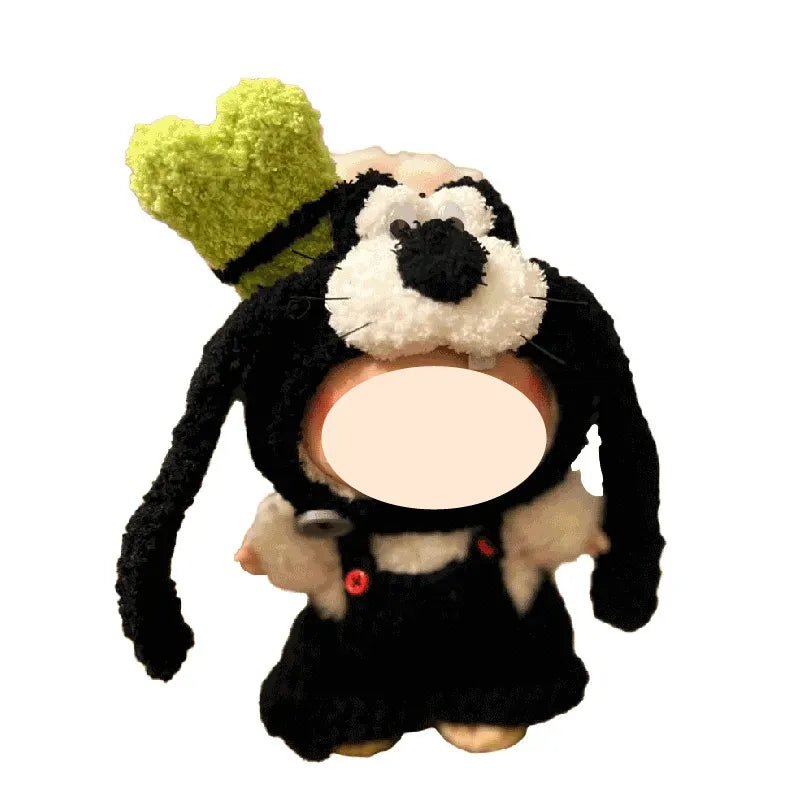 Plush toy resembling a cartoon character with a green hat on a white background