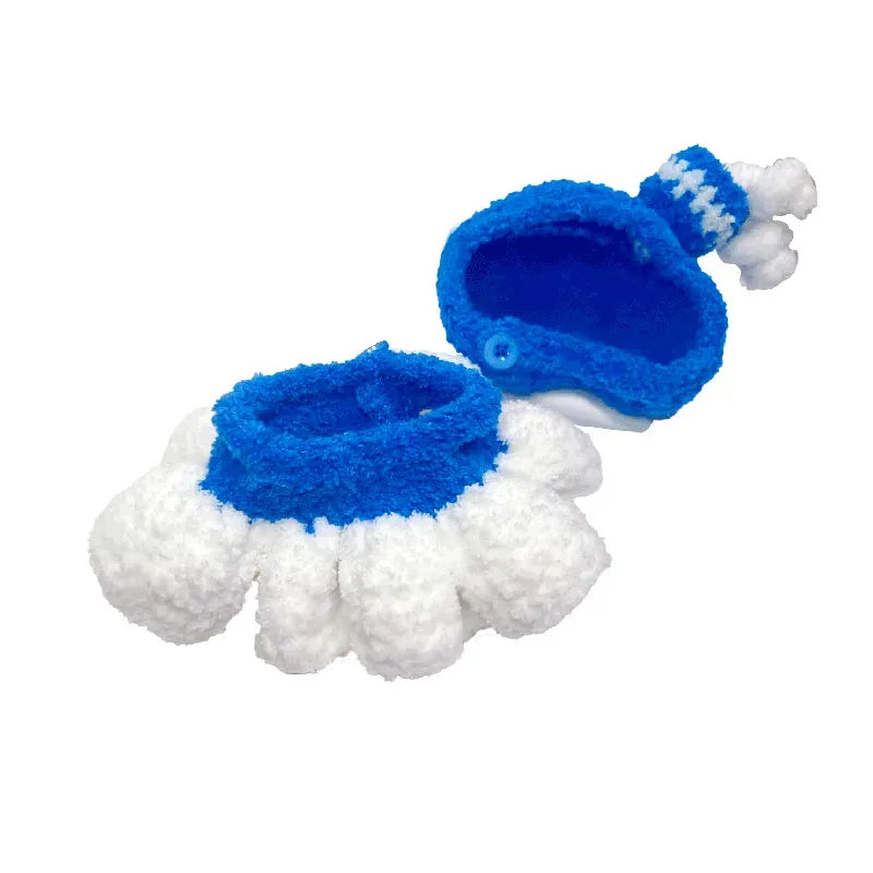 Blue and white baby booties on a white background