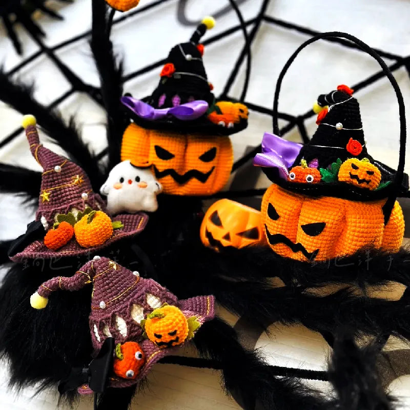 Crocheted Halloween decorations including pumpkins and gnomes on a spider web background.