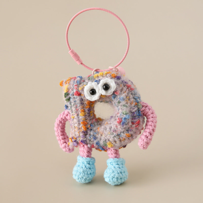 Alphabet Amigos Keychains handmade monogram charm with colorful knitted letter D and pink loop