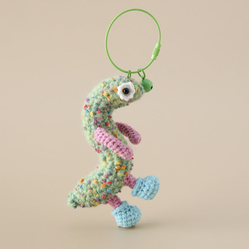 Alphabet Amigos Keychains - Handmade Monogram Charms featuring a colorful crocheted character with blue shoes and a green loop