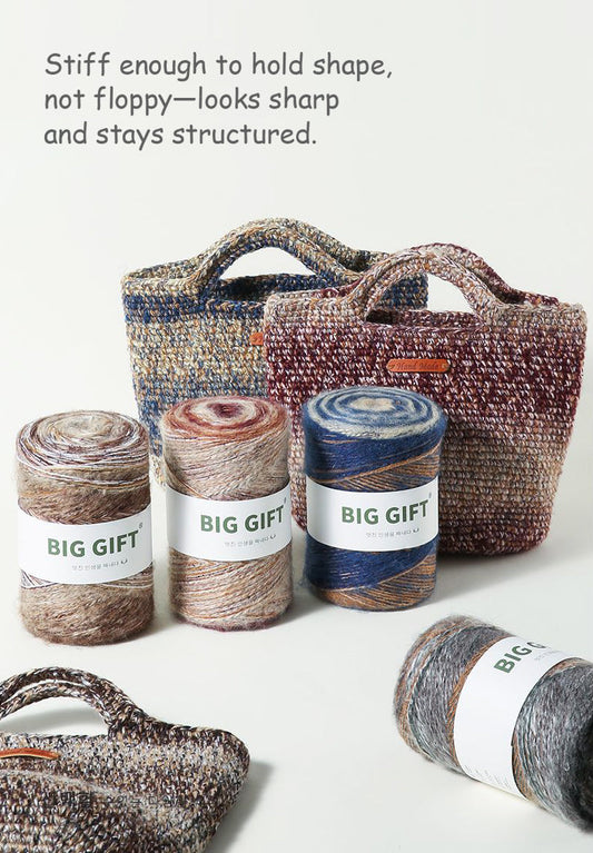Artisan wool blend for crochet displayed as yarn rolls and structured woven bags from 不二手作