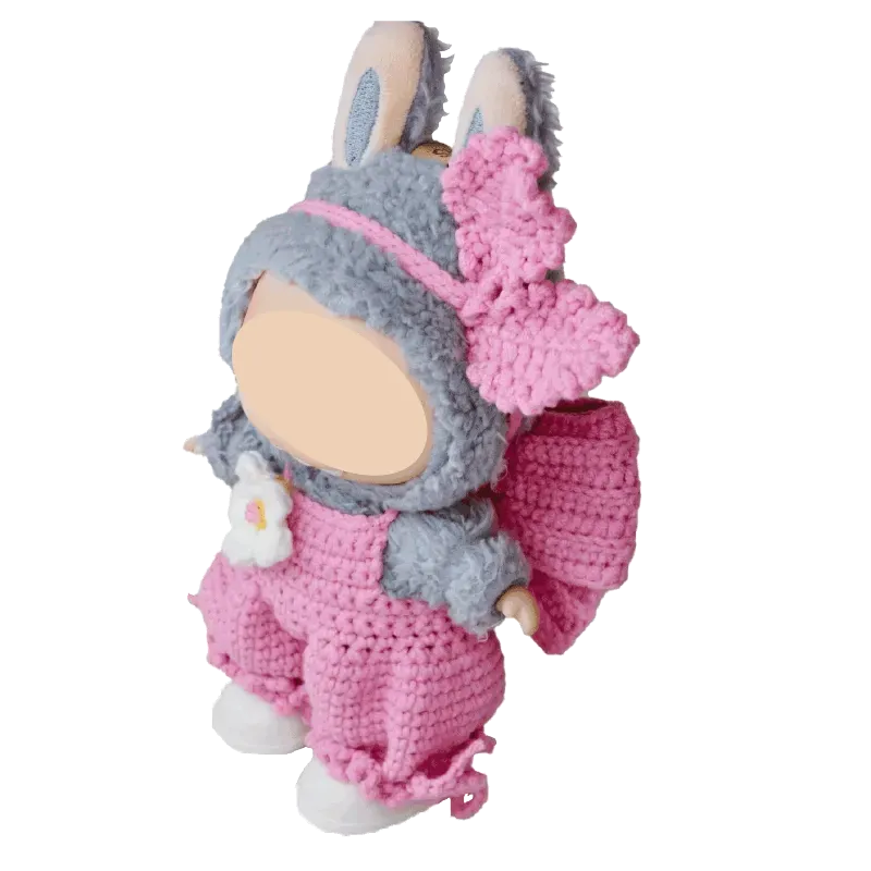 Cute plush doll wearing pink bubble pants crochet pattern for plush dolls with grey bunny hood and flower detail