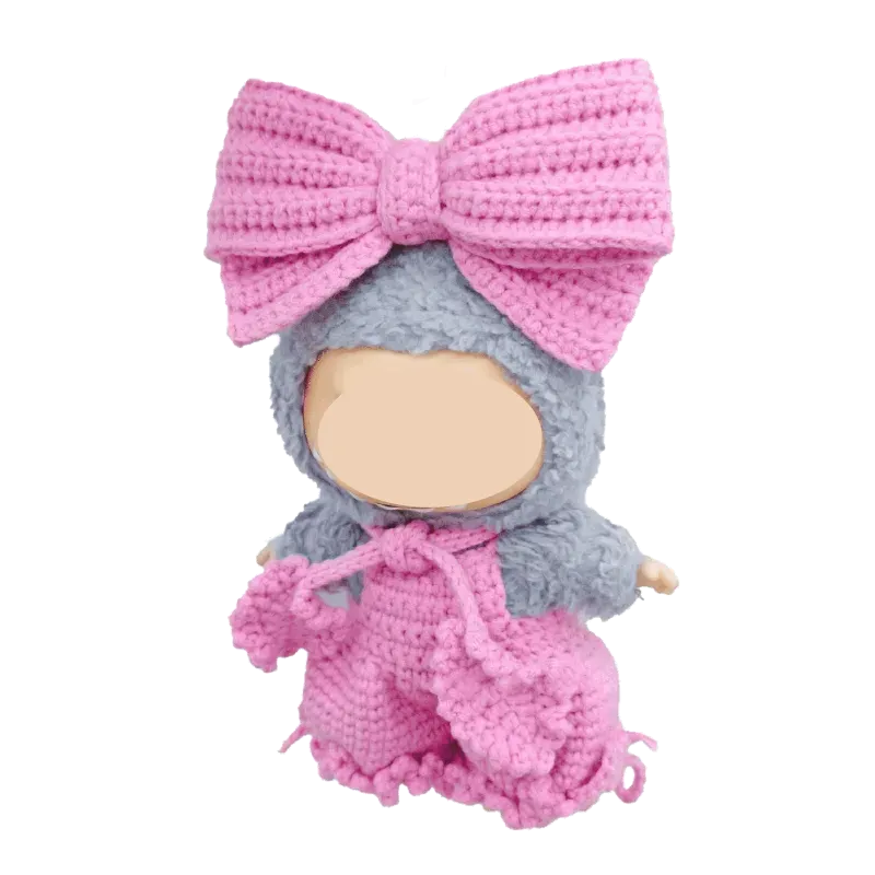 Bubble pants crochet pattern for plush dolls featuring a gray and pink handmade doll outfit with large bow hat