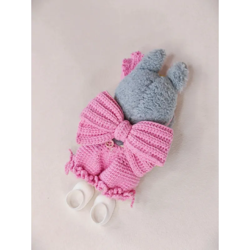 Plush doll wearing handmade pink bubble pants crochet pattern for plush dolls by redbook