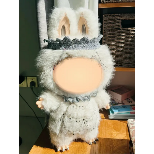 Collectible art doll crochet by The Knit Krazy wearing a fluffy bunny costume with crown
