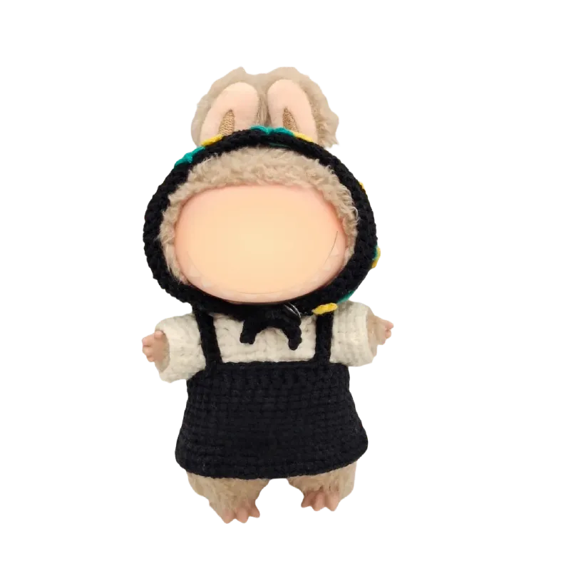 Collectible doll crochet outfit featuring a black dress and bunny ear hood on a soft doll