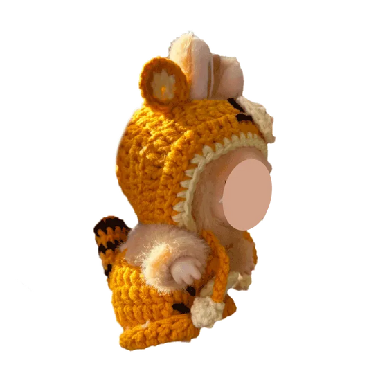Yellow crochet outfit pattern for 17cm dolls featuring a tiger costume with ears and tail