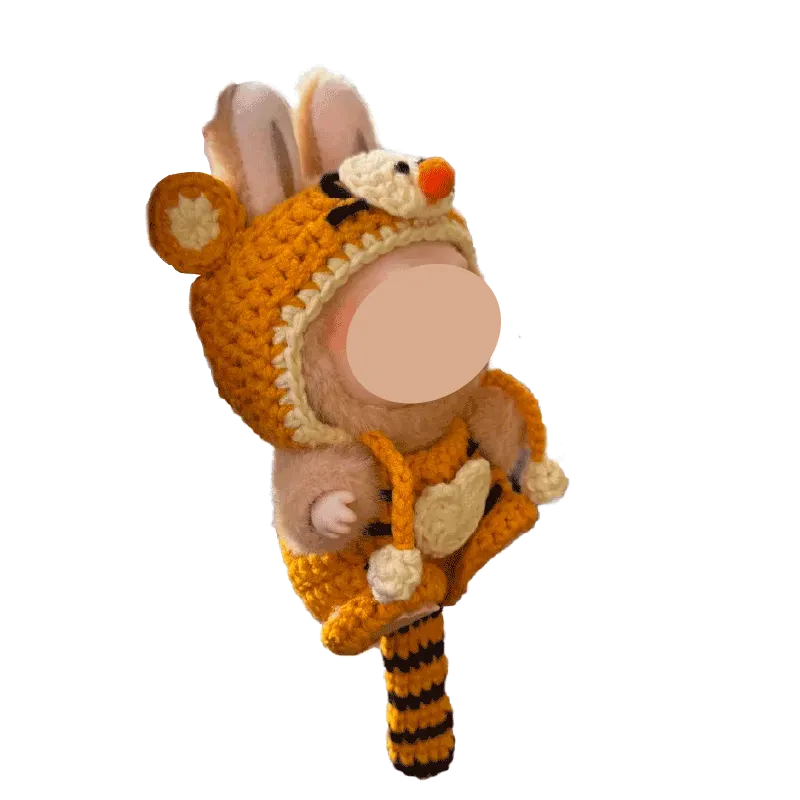 Crochet outfit pattern for 17cm dolls featuring a cute orange animal costume with ears and tail