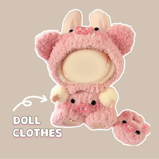 Pink crochet piggy doll outfit pattern including hat and shorts for cozy doll clothes