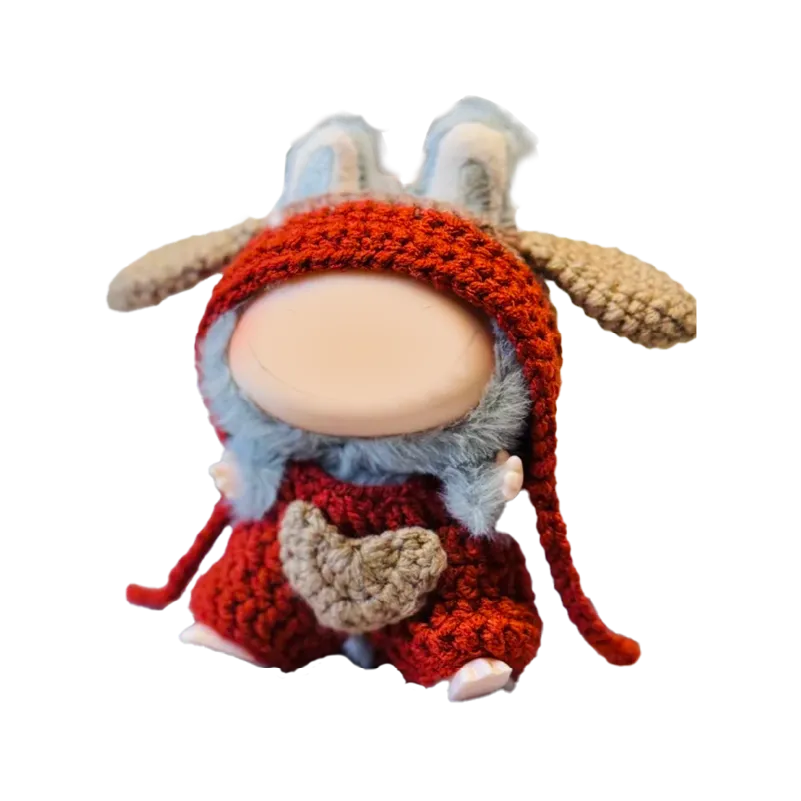 Cute knit doll wearing handmade red outfit with heart detail showcasing cute knit doll clothes pattern