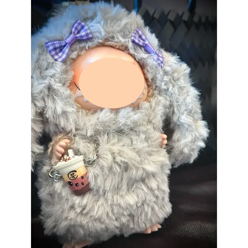 Fluffy bunny crochet doll wearing pink and gray outfit with ears and large bow fluffy bunny crochet pattern digital