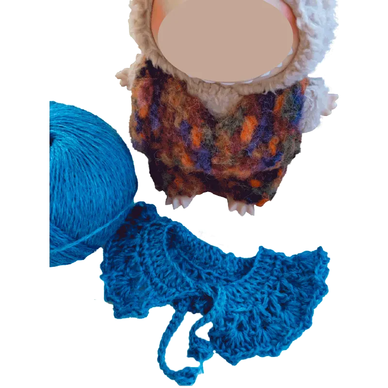 FREE crochet collar and hat pattern for plush dolls showing a blue crocheted collar and a plush doll wearing a knit outfit