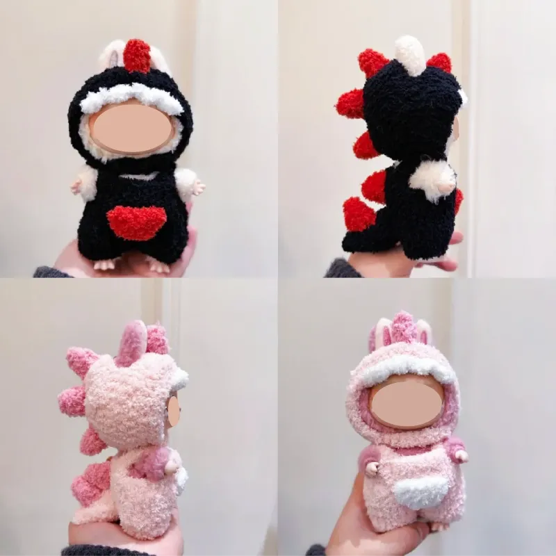 Free dinosaur crochet pattern featuring handmade black and pink dinosaur costumes for infants