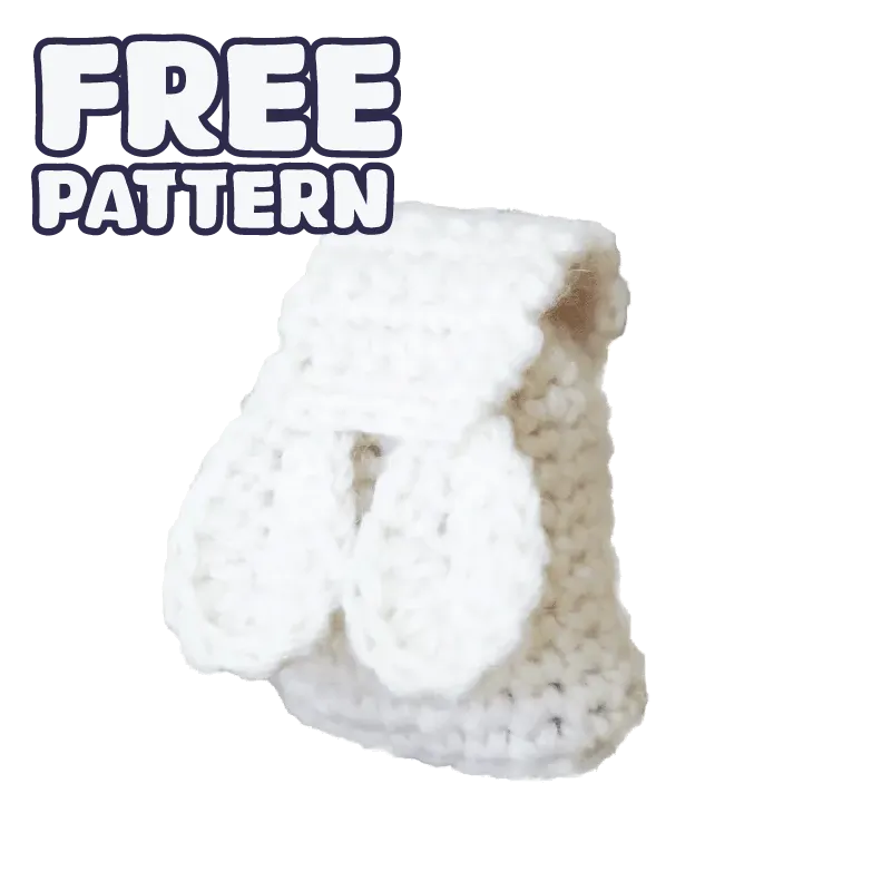 White crocheted miniature backpack with mittens using free doll accessories crochet pattern