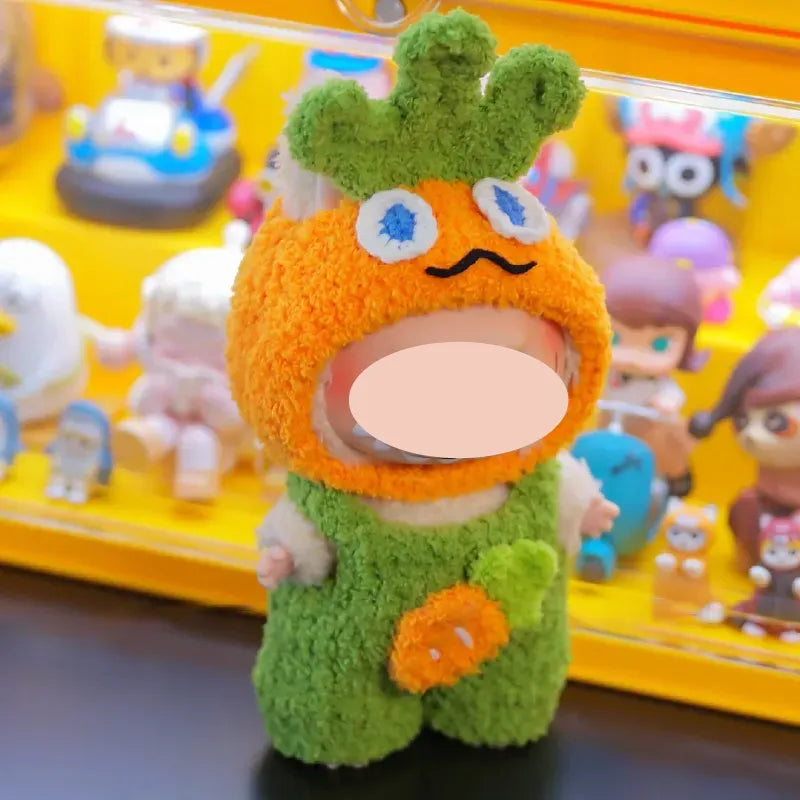 Cute crochet doll wearing an orange and green carrot costume from fun crochet costume patterns
