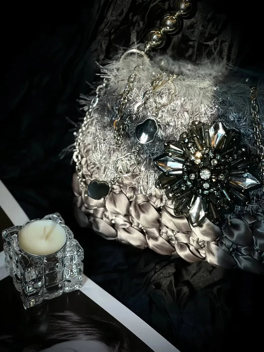 Crochet diagram for galactic inspired purse pattern by redbook featuring metallic and jeweled embellishments