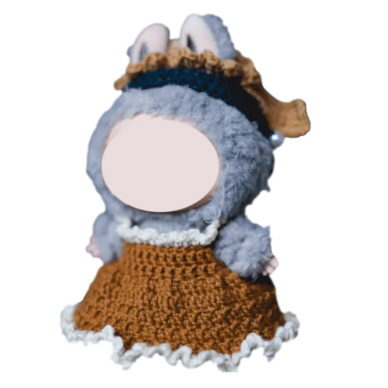 Handmade crochet girl with pearl earring doll clothes from redbook featuring a brown dress with white trim