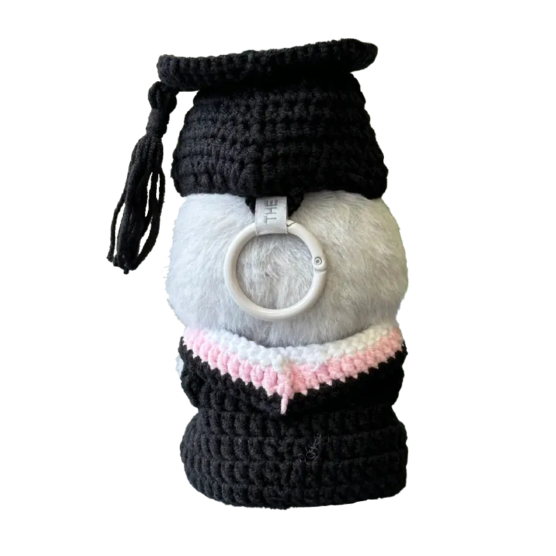 Handmade graduation doll crochet pattern with black cap and gown and pink collar detail