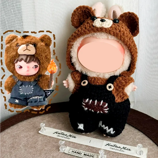 Handmade adorable doll wearing brown bear hoodie with black overalls by The Knit Krazy