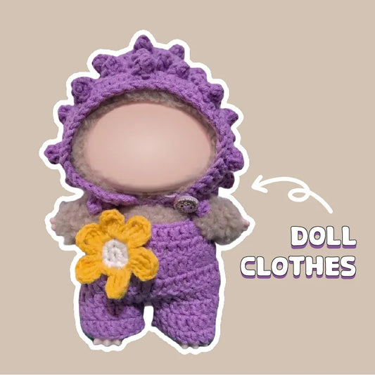 Purple beginner crochet doll outfit with yellow flower detail on handmade doll clothes by redbook