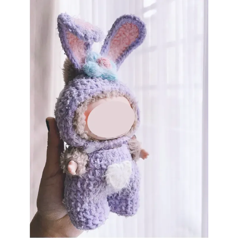 Collectible crochet dolls pattern featuring a handmade plush bunny doll in pastel purple and pink