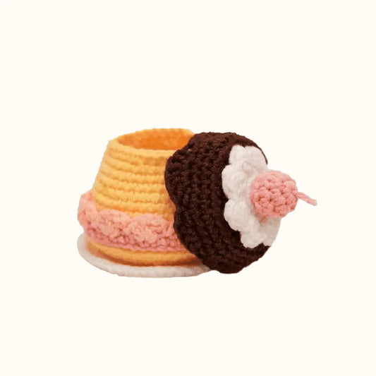 Handmade crochet caramel pudding pattern with pink cream and brown topping by The Knit Krazy