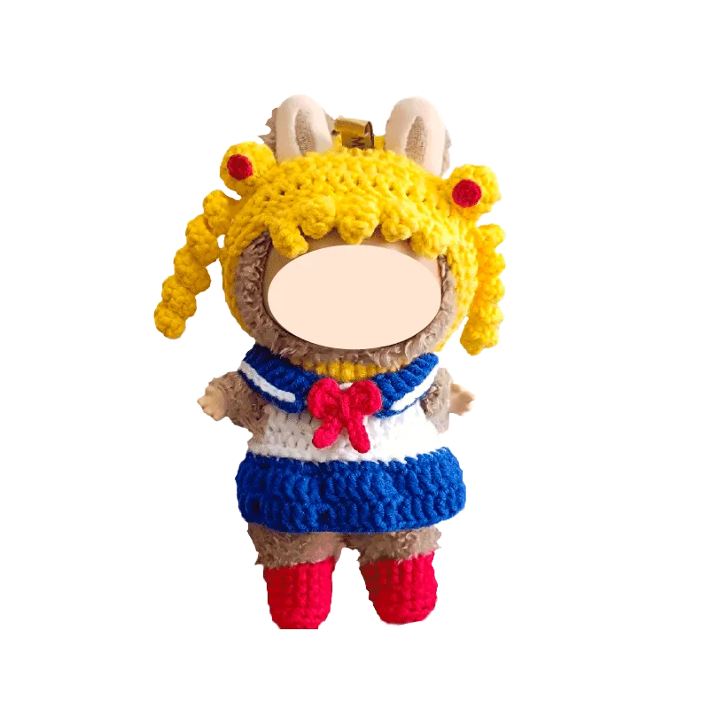 The Knit Krazy handmade crochet doll with yellow hair, blue and white sailor dress, and red shoes