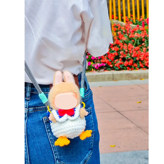 Cute handmade crochet Donald Duck bag pattern worn as a small crossbody accessory