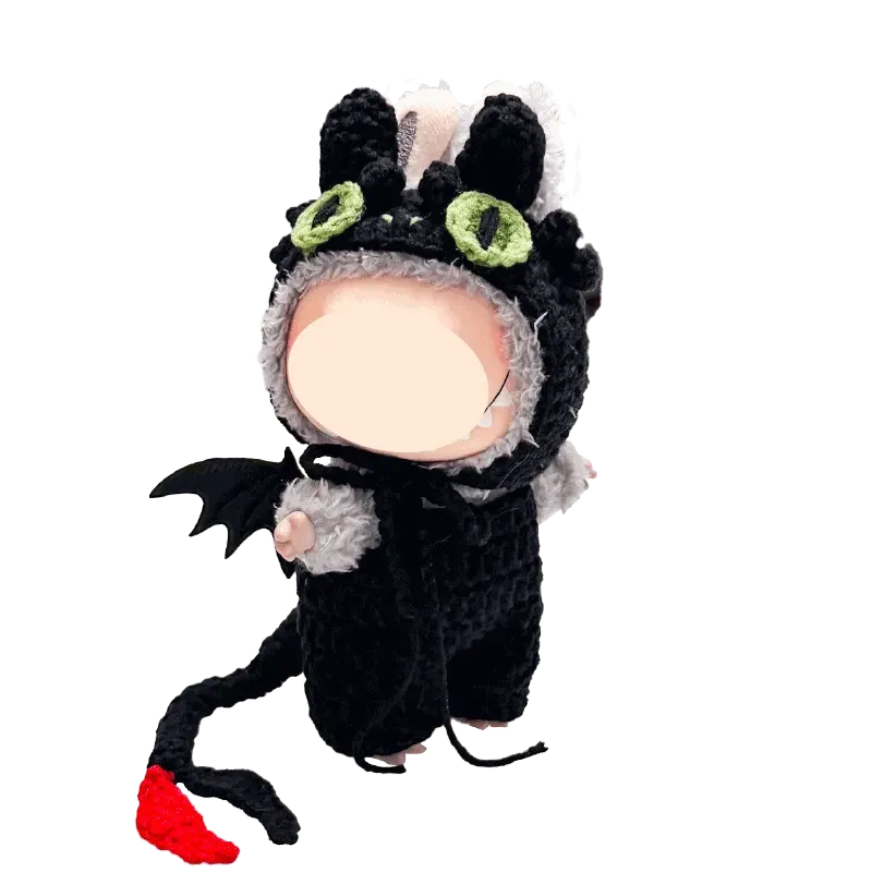 Handmade amigurumi doll wearing night dragon crochet pattern costume with wings and tail