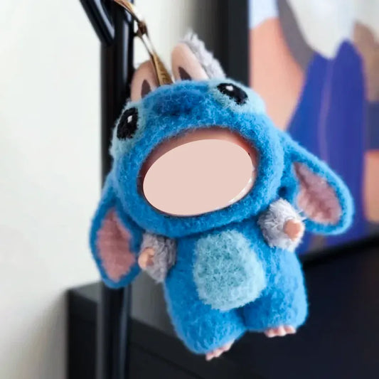 Blue plush toy keychain with big eyes and ears made using crochet pattern for 17cm plushie