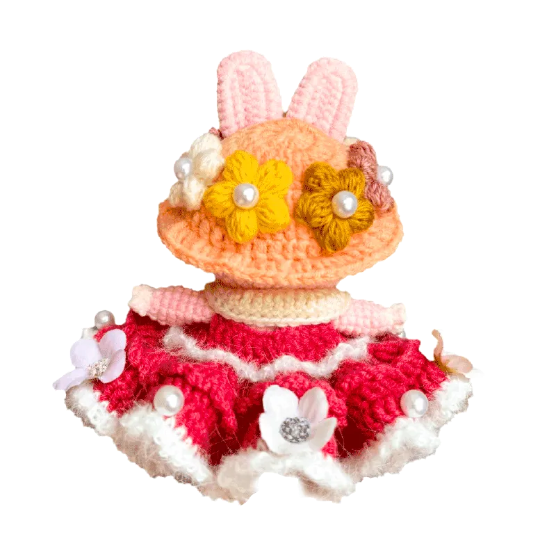 Princess crochet doll outfit pattern featuring a colorful dress and floral hat with bunny ears