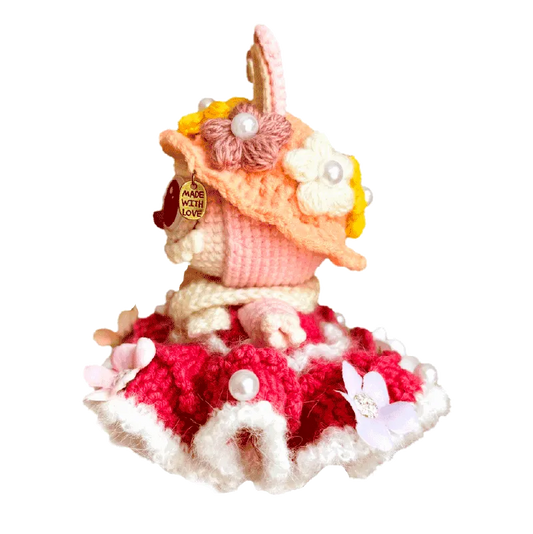 Handmade princess crochet doll outfit pattern featuring a pink and red dress with flower and pearl accents