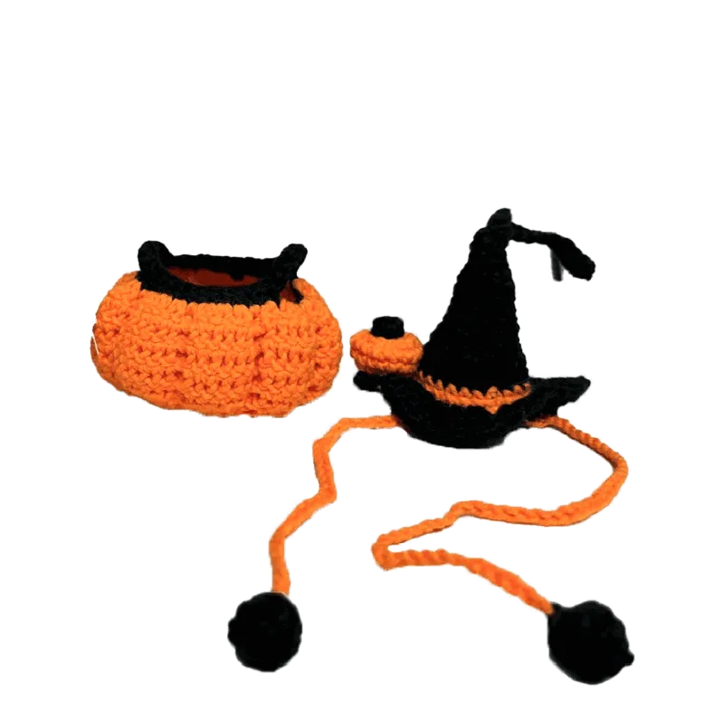 Handmade pumpkin costume pattern for dolls featuring a crocheted orange pumpkin dress and black witch hat