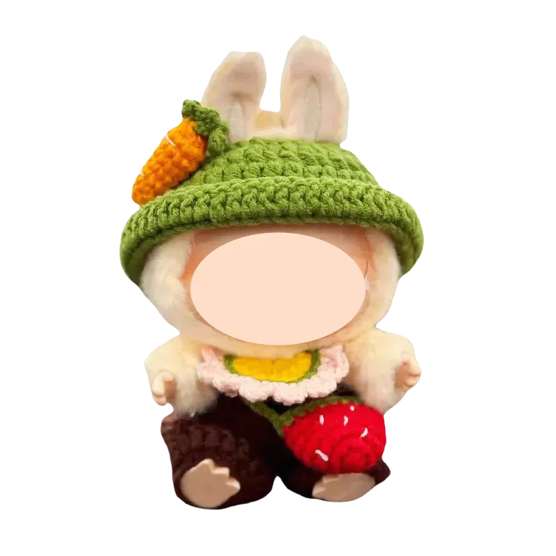 Cute bunny doll wearing green hat with carrot and strawberry carrot doll crochet pattern by The Knit Krazy