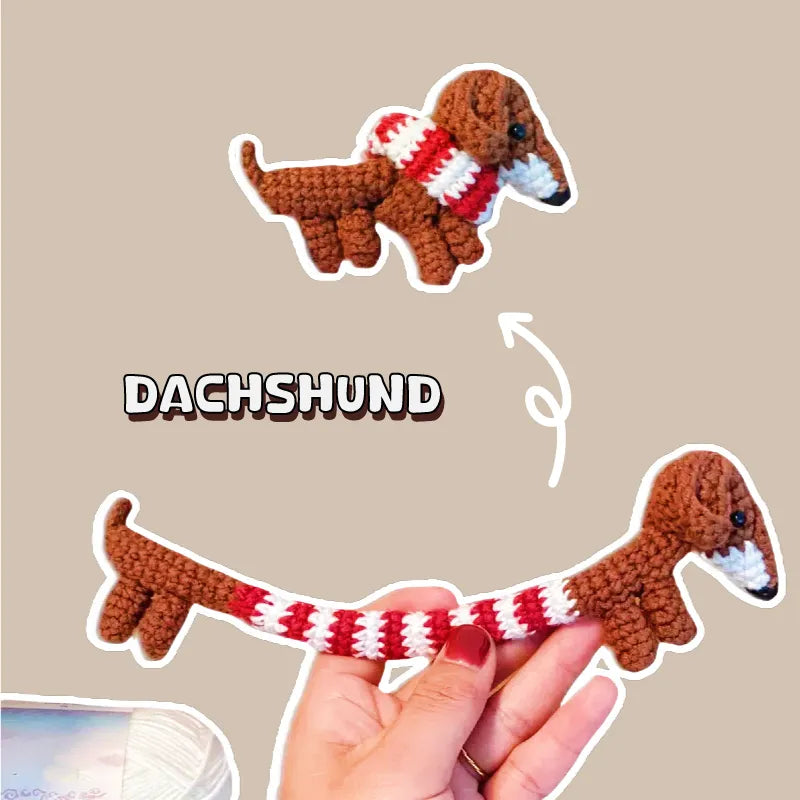 DIY dachshund amigurumi crochet diagram by The Knit Krazy showing handmade brown dachshund with red and white striped scarf