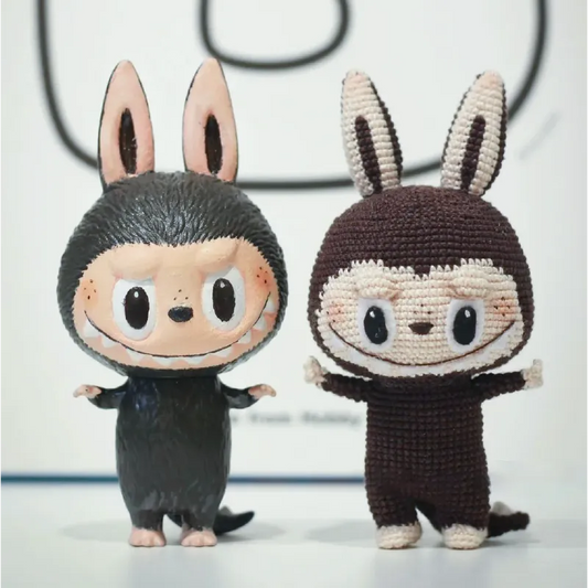 Two bunny character figures, one crochet, showcasing Zimomo inspired crochet pattern by redbook