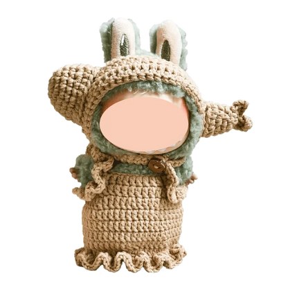 Handmade crochet doll wearing a bunny costume with ears and ruffled dress by The Knit Krazy