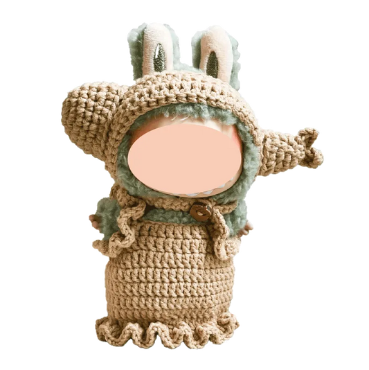 Handmade crochet doll wearing a bunny costume with ears and ruffled dress by The Knit Krazy