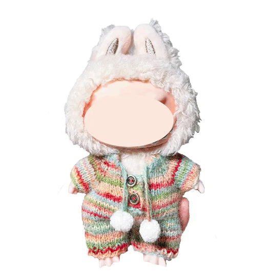 Plush toy with a colorful knitted outfit on a white background