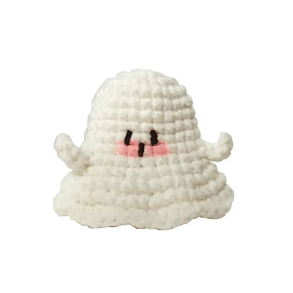 Small plush toy with a ghost design on a white background