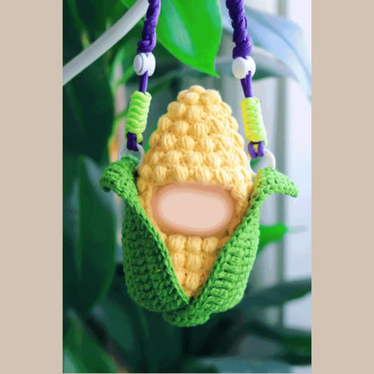 Amigurumi doll crochet kit featuring a handmade corn cob doll with green husk from redbook
