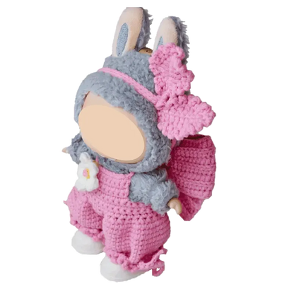 Cute plush doll wearing pink bubble pants crochet pattern for plush dolls with grey bunny hood and flower detail