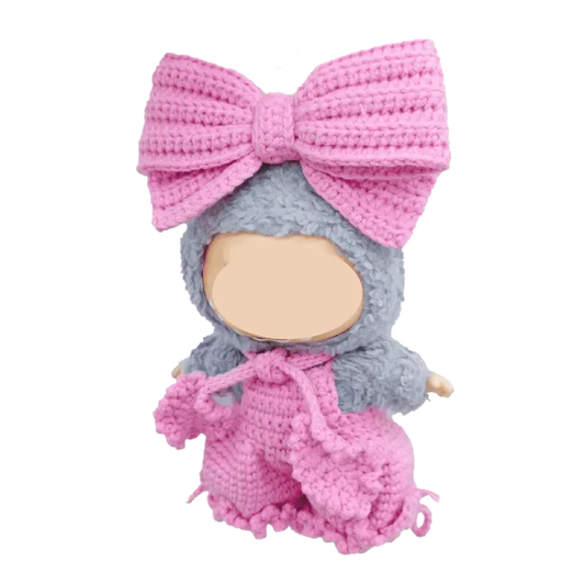 Bubble pants crochet pattern for plush dolls featuring a gray and pink handmade doll outfit with large bow hat