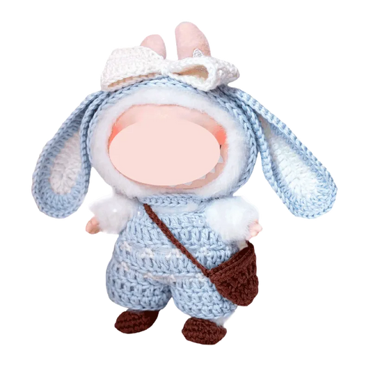 Cute crochet doll wearing blue bunny outfit with ears and brown bag bunny crochet doll clothes pattern