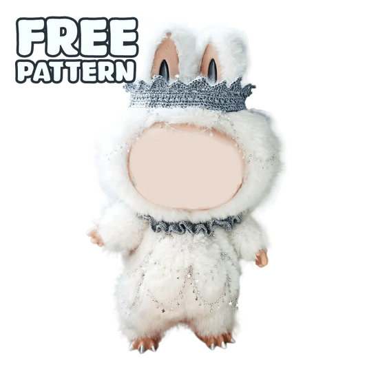 Collectible art doll crochet pattern featuring a fluffy white bunny costume with crown and ruffled collar