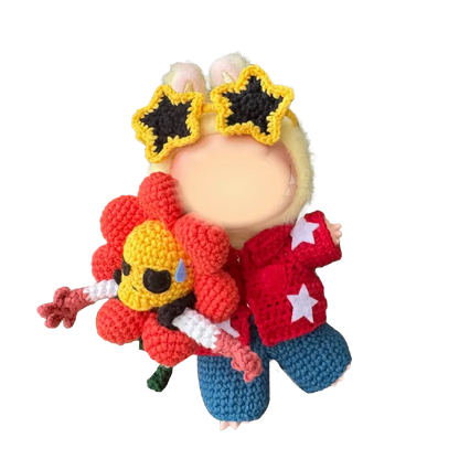 Redbook collectible doll crochet design featuring a figure with star sunglasses and a colorful flower accessory