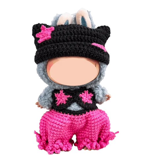 Handcrafted crochet doll wearing black and pink outfit with animal ears by The Knit Krazy