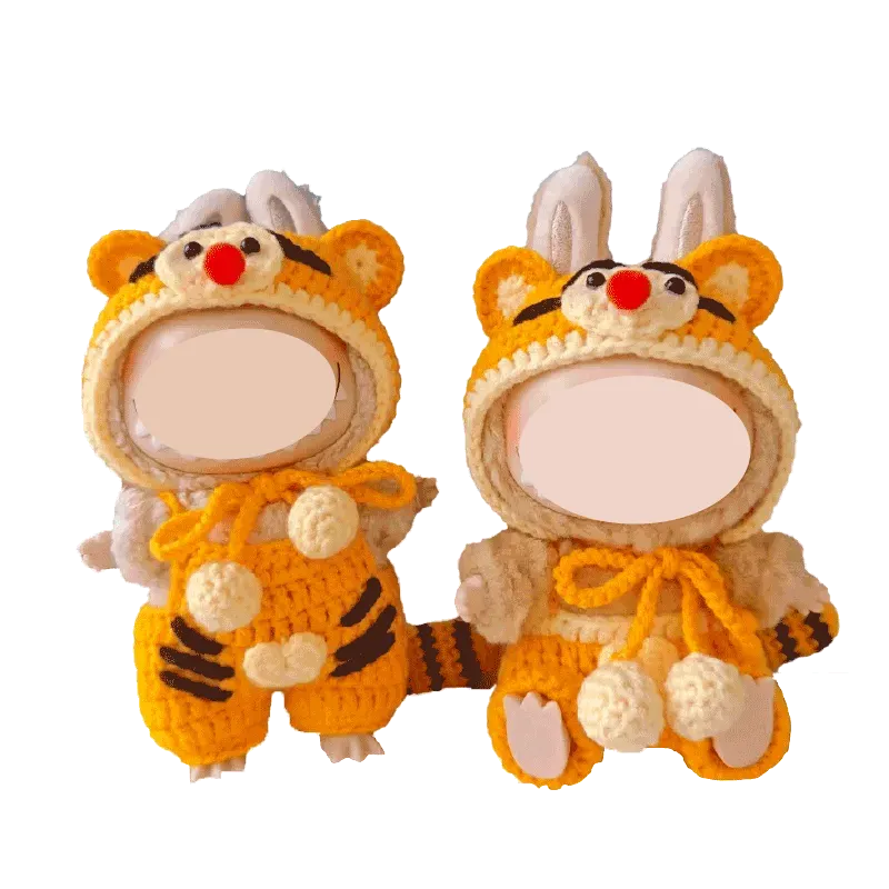 Redbook crochet outfit pattern for 17cm dolls featuring adorable animal-themed costumes with hoods and pom-poms